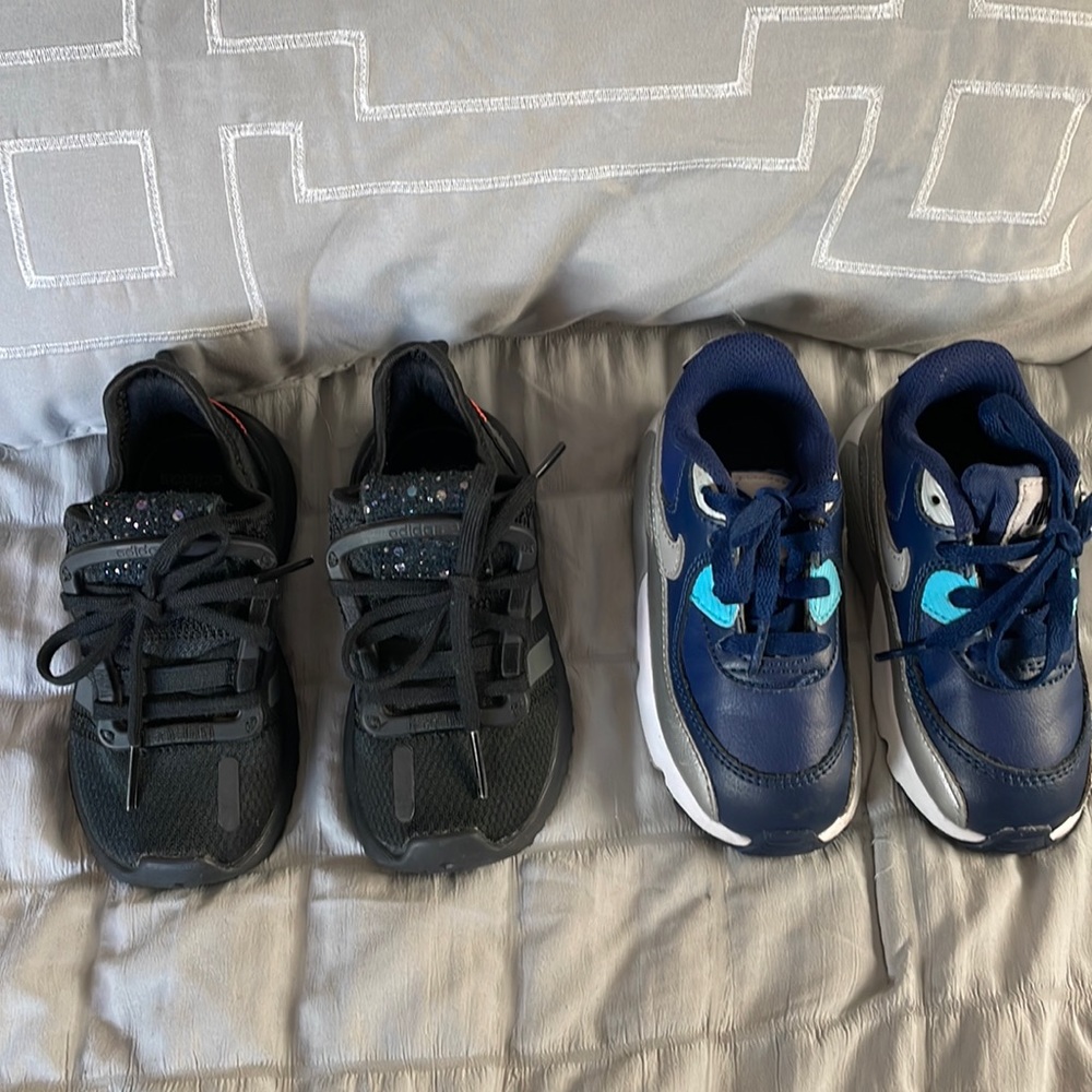2 pairs of toddler size 7 shoes. 1 adidas and one Nike.
